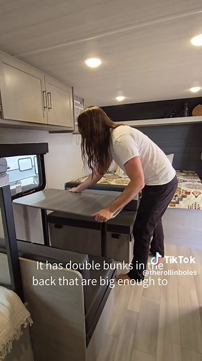 This one is for the trolls that say I'm too small for RV tours 😘 I present to you the tallest guy you will ever see doing camper tours 😂💁🏼‍♀️ For around the same price as a phone plan, the 2024 Keystone Springdale Classic 1800BH from @Camping World is the most affordable & spacious family travel trailer 👨‍👩‍👦 At 21 ft and 3,400 lbs this camper can be towed by most SUVs & trucks. 🛏 Sleeps 6 with a queen bed, convertible dinette, & bunkbeds. 💦 Freshwater - 21 gal - Gray - 30 gal - Waste w