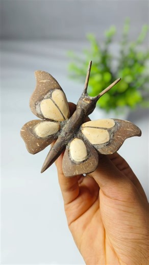 Boney | craft of coco | master ideas on Instagram: "🦋 Beautiful Coconut Shell Butterfly Craft 🌴✨ Description: Transforming natural coconut shells into a stunning butterfly craft 🥥🦋 Eco-friendly, handmade, and full of creativity! Perfect for home décor, gifts, and art lovers who enjoy sustainable crafts. If you love unique coconut shell art, don’t forget to like, share, and follow 💚 Hashtags: #CoconutShellCraft #ButterflyCraft #EcoFriendlyArt #HandmadeCraft #NatureInspired SustainableCraft D