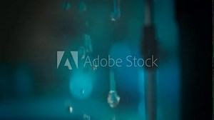 Spilling water in the coffee machine before making coffee in slow motion