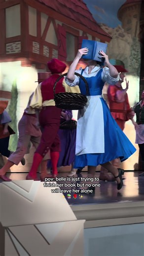 Belle Enjoys Reading Her Book at Disney Parks