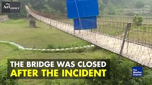 A swinging bridge collapses in China, leaving tourists dangling | The Weather Channel
