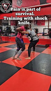 Training with shock knife. Accepting pain as part of survival can sharpen your ability to defend and overcome. #creatorsearchinsights #shockknife #SelfDefense #KnifeDefense #StayReady #lasvegascombatacademy #lasvegaskravmaga #kravmaga #levelUpJujitsu #bjj #brazilianjujitsu #muaythai #mma #boxing #striking #SelfDefense #boxingtraining #mmafighter #mma ##warriormindset #streetselfdefense | Las Vegas Combat Academy