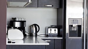 Hide The Eyesore Of Kitchen Appliances With This Genius Storage Solution - Hunker