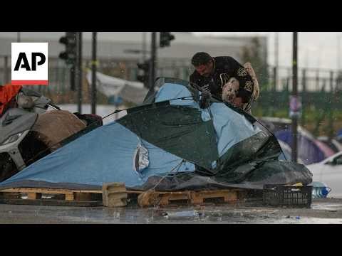 Heavy rain and strong winds batter tents used by displaced people in Beirut