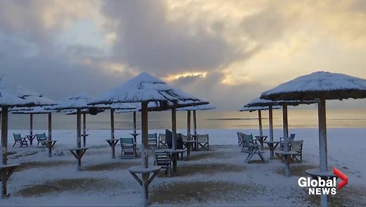 Athens beaches buried in snow as temperatures across Greece hit record lows