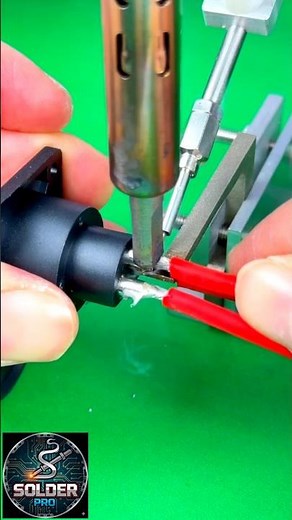 The video displays a close-up of a soldering process for an electrical connector #solderingtool