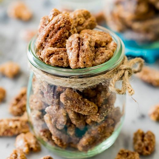 These easy homemade candied pecans can be roasting in your oven in under ten minutes! RECIPE: https://sugarspunrun.com/candied-pecans/ | Sugar Spun Run