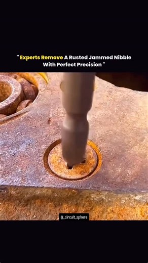 Circuit Sphere on Instagram: "Watching experts remove a rusted, jammed nibble is a masterclass in patience, physics, and respect for materials. What looks like a stubborn piece of metal frozen in time is actually a conversation between corrosion, pressure, and technique. Years of moisture have bonded surfaces together, shrinking tolerances until movement feels impossible. Instead of brute force, precision takes the lead. Heat is applied slowly to expand metal just enough to break the rust’s grip