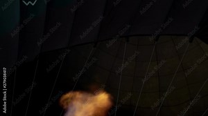 Fire flame inside a hot balloon. Strong and powerful fire filling air balloons with warm air. Hot balloon celebration in Spanish town Igualada. International meeting of hot air balloons Stock Video