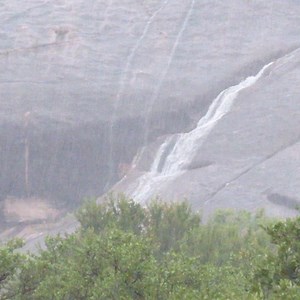 17K views · 583 reactions | thunderstorm noise. Within 5 minutes of starting to rain, water is already gushing off the rock. All elevated trails are currently closed. We will reopen them after the rain stops and the rock has time to dry out. Feel like a hike in a thunderstorm? The Loop Trail remains open for hiking. | Enchanted Rock State Natural Area - Texas Parks and Wildlife | Facebook