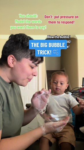 The BUBBLE TRICK! Get your hands very soapy and make an opening between your pointer and middle fingers to blow a bubble! Try this one at home! #speechtherapy #speechtherapist #earlyintervention #parenting #toddlers