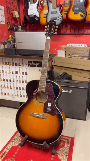 12 reactions | Epiphone EJ-200 Artist Acoustic Guitar #Epiphone #EpiphoneGuitar #EpiphoneEJ200 #EJ200Artist #JumboGuitar #AcousticGuitar #AcousticGuitarReview #GuitarSoundCheck #GuitarTone #StrummingGuitar #RhythmGuitar #SingerSongwriter #SteelStringGuitar #GuitarBangladesh #BDGuitar #BangladeshiGuitarist #MusicShopBD | Blues & Guitars | Facebook