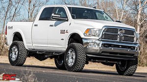 Fresh off the rack from our R&D facility in West TN, this 2017 Ram Trucks 2500 Heavy Duty received a Rough Country 5-inch Suspension Lift, Wheel to Wheel Nerf Steps, and a Bumper-Mounted 20-inch Single Row LED Light Bar. It was also outfitted with KMC Wheels XD-Series Chrome XD809 Riot 20” x 9” Wheels with 8x165.10 bolt pattern, 18mm Offset, and 5.71-inches of Backspacing wrapped in Nitto Trail Grappler 35x12.50R20 Tires. Be sure to like Rough Country for more vehicle profiles. Featured Vehicle: