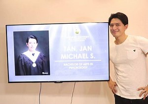 Mike Tan graduates college with a degree in psychology