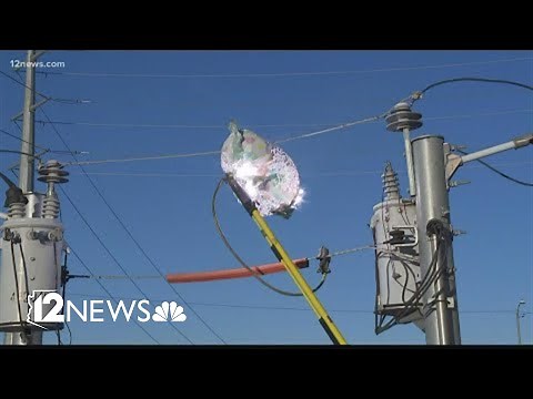 APS demonstrates what happens when mylar balloons get tangled up in power lines