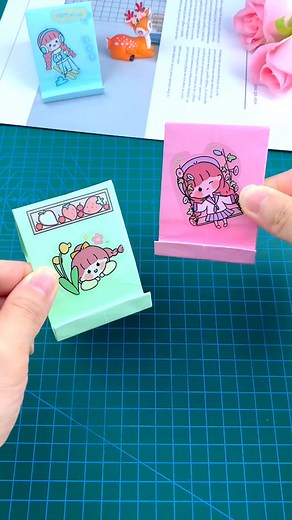 15K views · 112 reactions | In a few simple steps, I will teach you to fold a practical mobile phone holder. #origami #origamiart #art #handmade #paperart #paperfolding #paper #papercraft #origamipaper #papiroflexia #origamilove #diy #origamiartist #papercrafts #origamilovers #instaorigami #craft #origamiwork #d #design #creative #artist #paperartist #love #origamicrane #modularorigami #origamifun #paperfold #kusudama #origamicraft paper craft ideas | paper craft ideas | Facebook