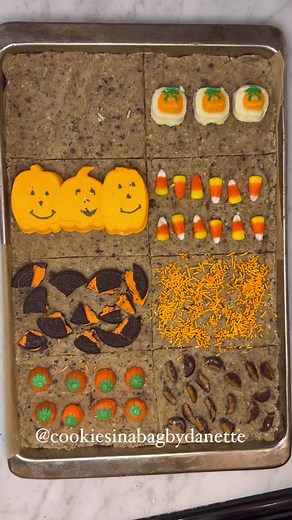 How fun is this Halloween cookie cake! Grab some of your favorite...