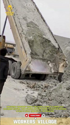 A material transport truck is unloading a load of clumped clay or cement mixture