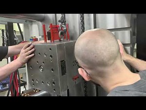 Setting a mold in a TOYO Si-300-6s Injection Molding Machine