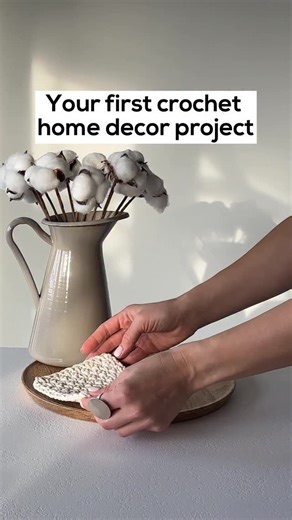 Marina▫️Crochet designer🤍Crochet kits & patterns on Instagram: "Your first step into modern crochet home decor 🤍 This FREE Linen Coaster crochet pattern is perfect for beginners — even if you’ve never crocheted before. ✔️ Takes about 20 minutes ✔️ Only braided cotton cord 3 mm ✔️ One hook, one material — no confusion ✔️ Step-by-step written instructions ✔️ Short videos for every new step ✔️ How to get clean edges and hide tails like a pro With just one skein, you can crochet up to 4 coasters. 