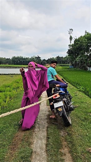 The bride and groom are walking down the street.#automobile
