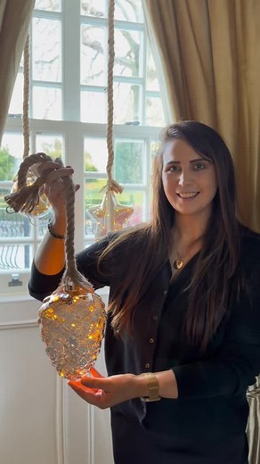 1.2K views · 28 reactions | Nicole is back with the prettiest LED hanging ornaments, all battery operated and so easy to use. ⭐️ She shows how to place them in windows using Nano Gel, and they look just as good tucked into your Christmas tree for an extra glow. ✨ Available in-store and online. https://www.arboretum.ie/shop/products/christmas/christmas-lights/battery-operated-lights-and-candles/page-2.html | Arboretum Home & Garden Heaven | Facebook