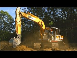 An Excavator And Bulldozer Get To Work Preparing A Construction Site from House Construction Ahead