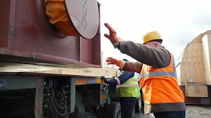 Men working loading a freight truck - Free Stock Video