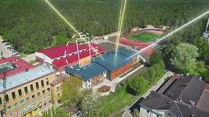 Photovoltaic system absorbing electricity for a school building - CGI render