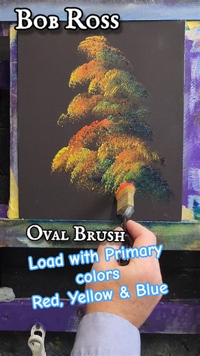 Bob Ross oval brush loaded with primary colors for a pretty tree in fall #bobross #shortsart