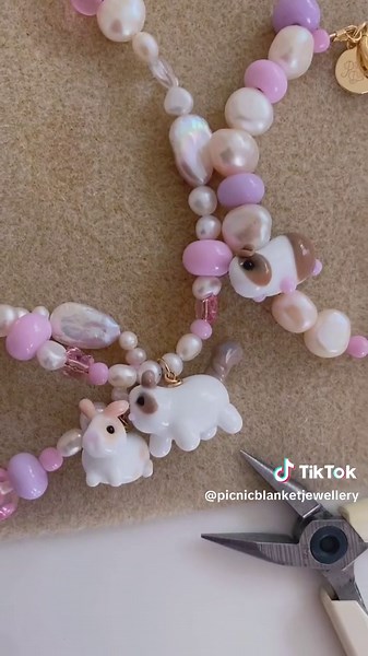 Lets make a cat bead! Wait… what?! 🐈🎀🌸🧺 #bunnygirl #guineapigmom #guineapig #lampwork #beadedjewellery #glassbeads #lampworkbeads #catsoftiktok #catjewelry