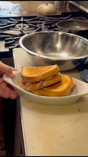 Our Toastie layers rich Irish Cheddar, Fischer Family Farms ham, fresh tomato, onion and pickle— all grilled to perfection! 🥪 | The Anchor Fish & Chips