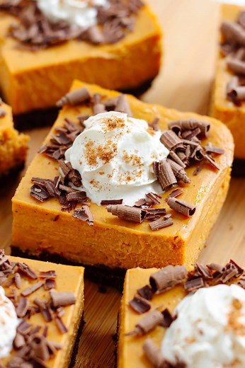 This is your sign to skip the fussy cheesecake and make these instead.  Creamy, spiced pumpkin cheesecake on a chocolate graham cracker crust (yes, please!!!). 襤 These bars are pure fall dessert magic! All the cozy pumpkin cheesecake flavor, none of the stress. No water bath, no springform pan drama, just easy deliciousness! RECIPE ⬇️ https://www.mapleandmango.com/pumpkin-cheesecake-bars/ | Maple + Mango | Facebook