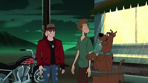 Axl Rose, made a cameo appearance as an animated version of himself on an episode of Scooby-Doo And Guess Who? on February 25, 2021 When Fred, Velma, Daphne, Shaggy, and Scooby take a road trip down historic Route 66, they encounter a mysterious group of mud men who steal the Mystery Machine. While stranded in the desert, they check out an abandoned diner “to see if they have Wi-Fi inside” - Daphne’s priorities - where they discover Axl, who turns out to already be buddies with Shaggy and Scooby
