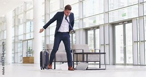 Slow internet is enough to let me lose my cool. Angry businessman throwing a laptop in a convention centre, airport or office. Stressed caucasian man getting mad, frustrated and upset at broken tech Stock Video