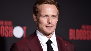 Sam Heughan celebrates 'lockdown is over' as he poses on golf course