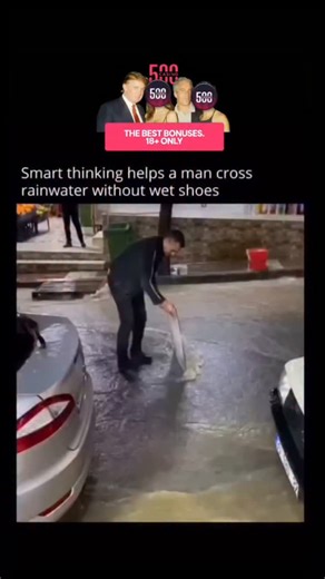 Science Tech on Instagram: "The post features a 10-second video showing a man in a Turkish parking lot using pure street smarts to beat the rain. With rainwater flowing like a small stream across the pavement, he places a large piece of cardboard on the ground and confidently steps over it, using it as a temporary bridge to keep his shoes dry. Turkish subtitles add humor to the moment, joking that no matter the weather, his mission to reach a nearby coffee shop cannot be stopped. His calm, deter