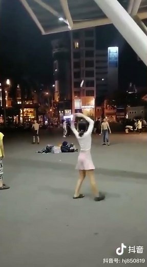 Playing Jianzi, a traditional Chinese game