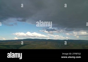 8K 7680x4320.Strong heavy rain and storm clouds are approaching coming.A supercell is a downburst thunderstorm by the presence of a mesocyclone.Curtain of rain.Nimbostratus is a multi-level, gray, amorphous thunderbolt. Dangerous, nature weather Stock Video Footage - Alamy
