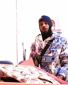 250K views · 2K reactions | "If Aladdin had a book bag this would be his book bag." Michael K. Williams meets an underground booster who is selling top designer clothes for a fraction of the shop price. | VICE | Facebook