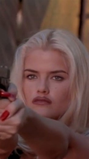 Anna Nicole Smith on Instagram: "Anna Nicole Smith in Skyscraper as Carrie Wink, 1996 "