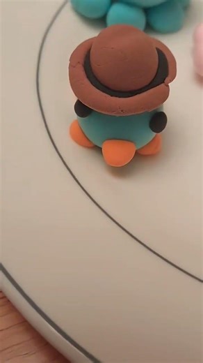 A platypus? PERRY THE PLATYPUS?! (platypus and fedora made by bill)