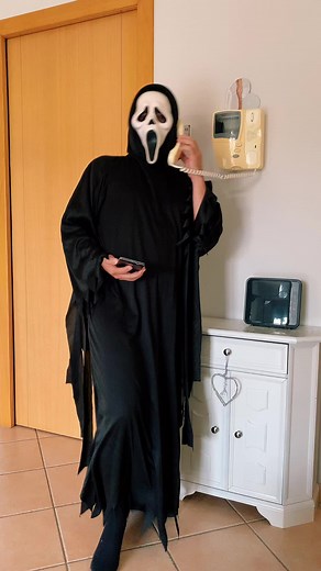 Ghostface Costume Fun: Indoor Dance and Conversation