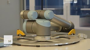 We programmed a manufacturing robot to high five