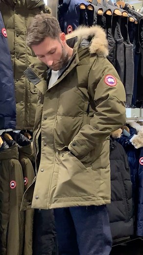 Introducing the Canada Goose Emory Parka in Military Green—a cold-weather icon. Crafted in Canada the Emory is an investment in enduring performance, allowing you to face harsh winters head on. With its mid-length design and weatherproof outer, this parka shields from icy conditions while a suede tricot-lined chin guard and a removable fur ruff provide elevated protection. Available in-store and online today. - #canadagoose #canadagooseparka #parka #jackets #aphrodite1994 | Aphrodite Clothing