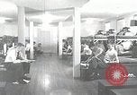 1950 – San Antonio Texas USA: USAF Aviation cadets relaxing in their barracks at Lackland AFB. Cadets being inspected by a tactical officer.
