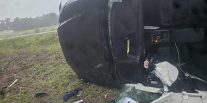 Firefighters rescue person pinned inside crashed car