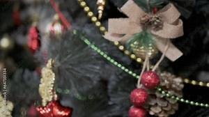 Ornate Christmas Tree with Christmas Toys in a Mirror Reflection. Reflection of red and golden sparkling balls in mirror. Preparation. Textured effect. Beautiful Christmas background, design, style.