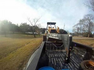F350 pulling case 580 super L backhoe