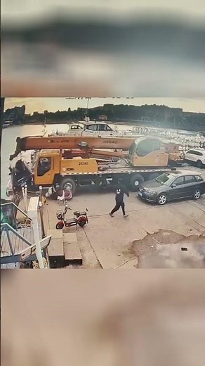 Crane lost control and crashed into car